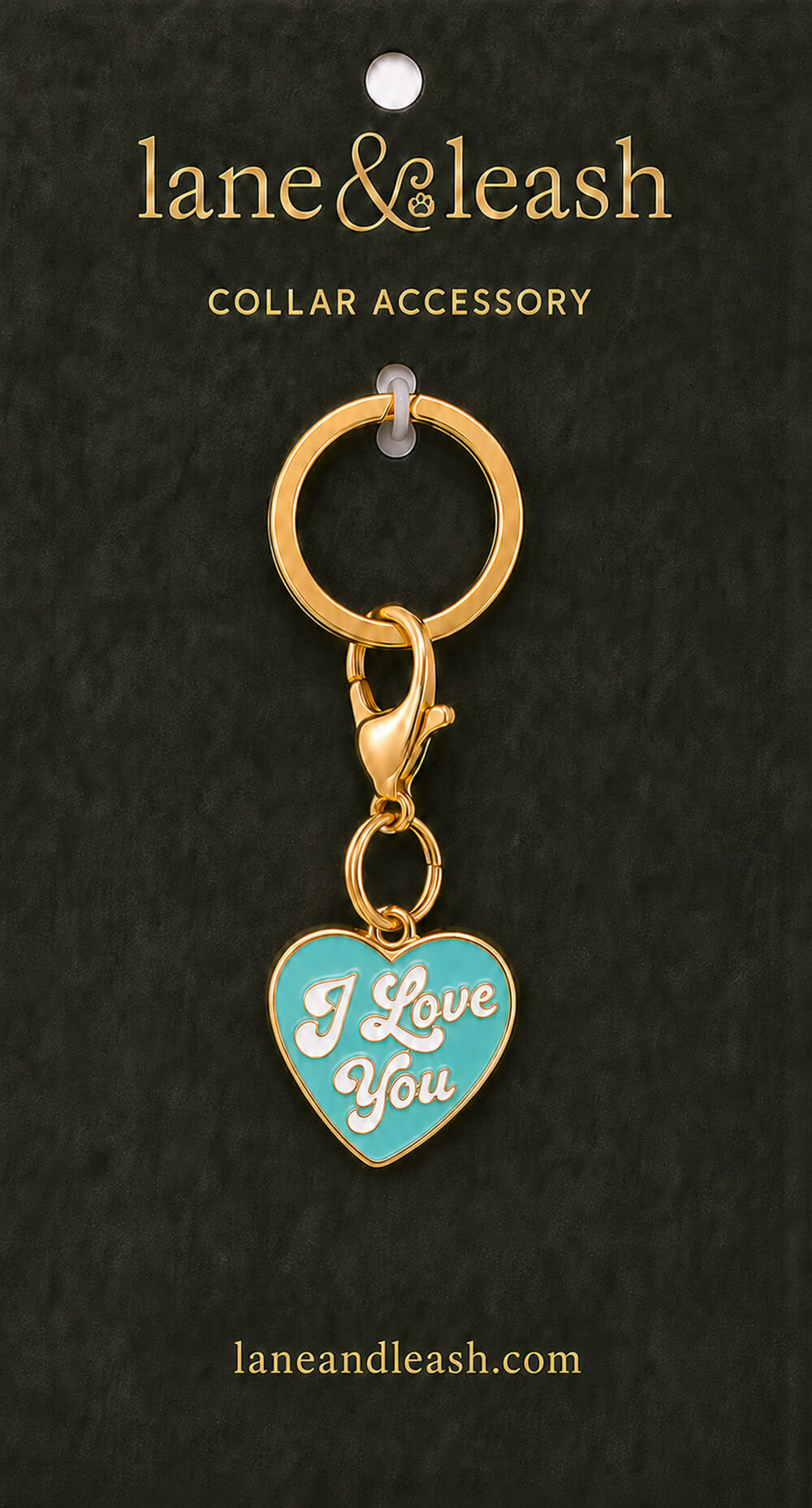 Teal enamel I Love You heart Lane & Leash collar accessory charm displayed on dark green packaging card with lobster claw clasp and jump ring