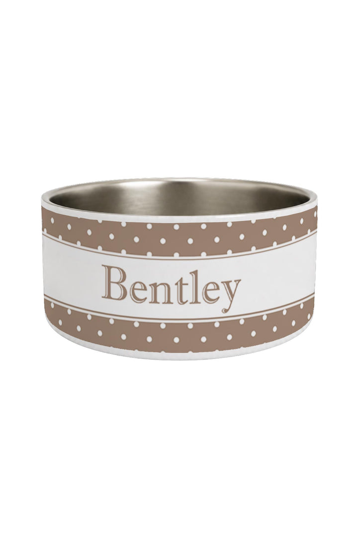 Personalized stainless steel pet bowl with latte brown polka dot band and the name 'Bentley' in a white center panel