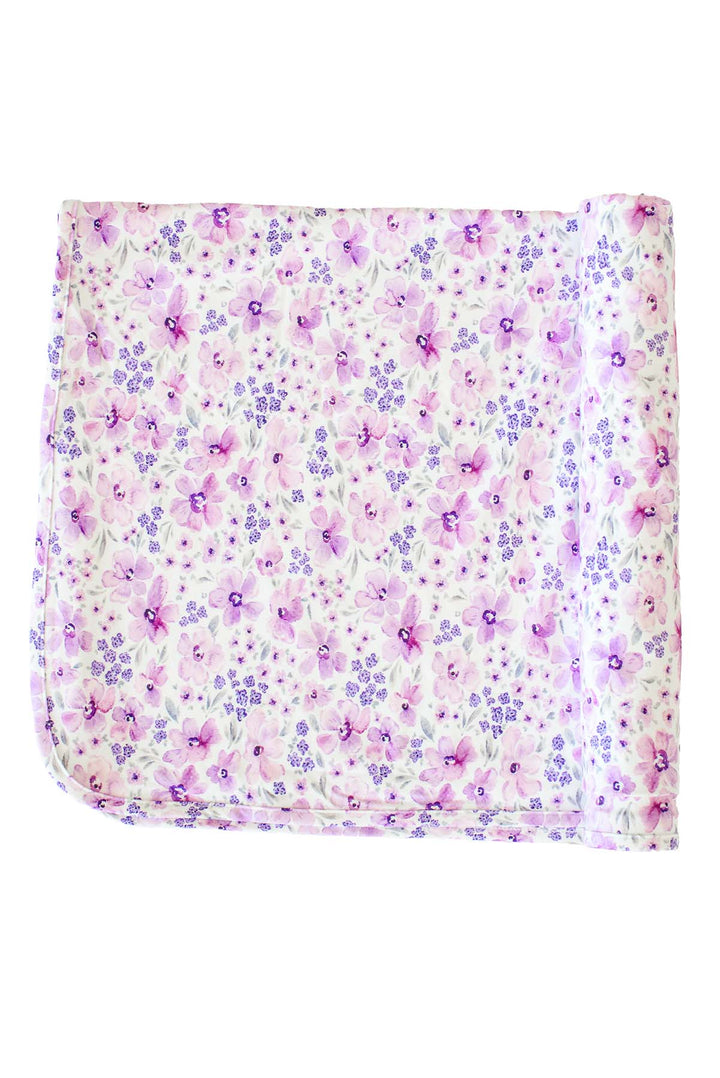 The rounded, bound corners made me think it's a knit blanket rather than the swaddle. If it's actually the swaddle, swap "blanket" for "swaddle" and move it into that group.