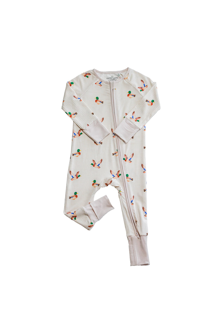 Flat lay product shot of little mallard duck print convertible zip romper showing full garment with double zipper and duck print