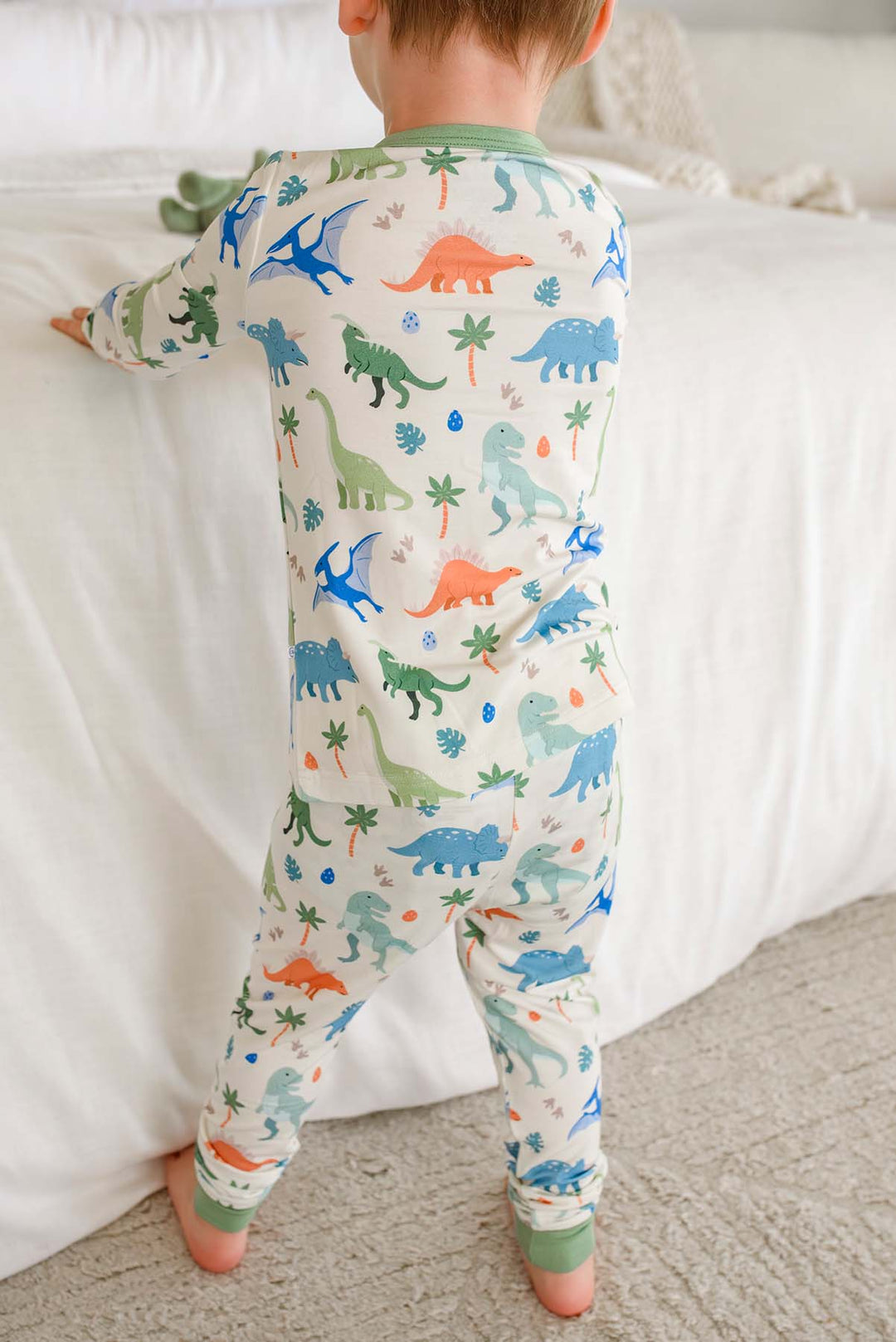 back view of little fossil neutral two piece pajama set