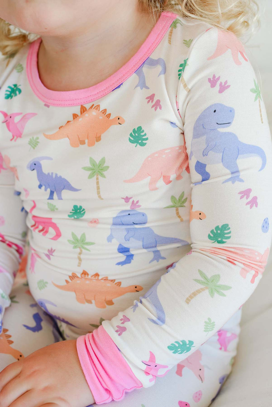 closeup of little fossil pink two piece pajama set