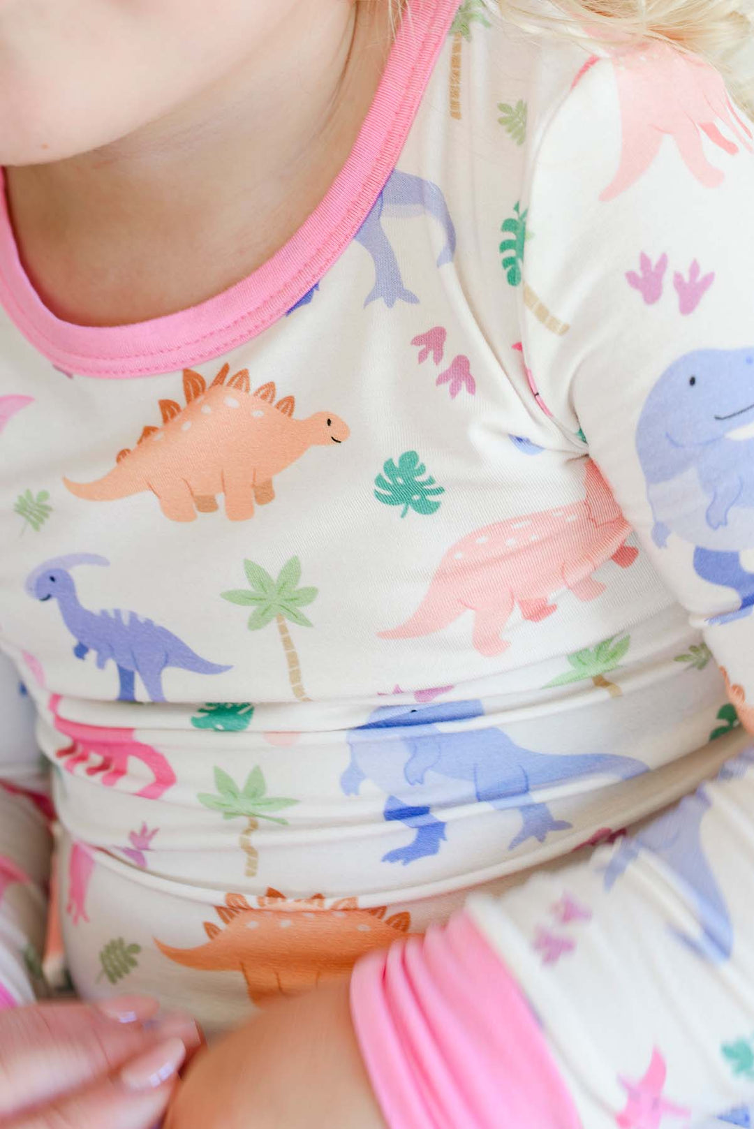 closeup of little fossil pink pajama set