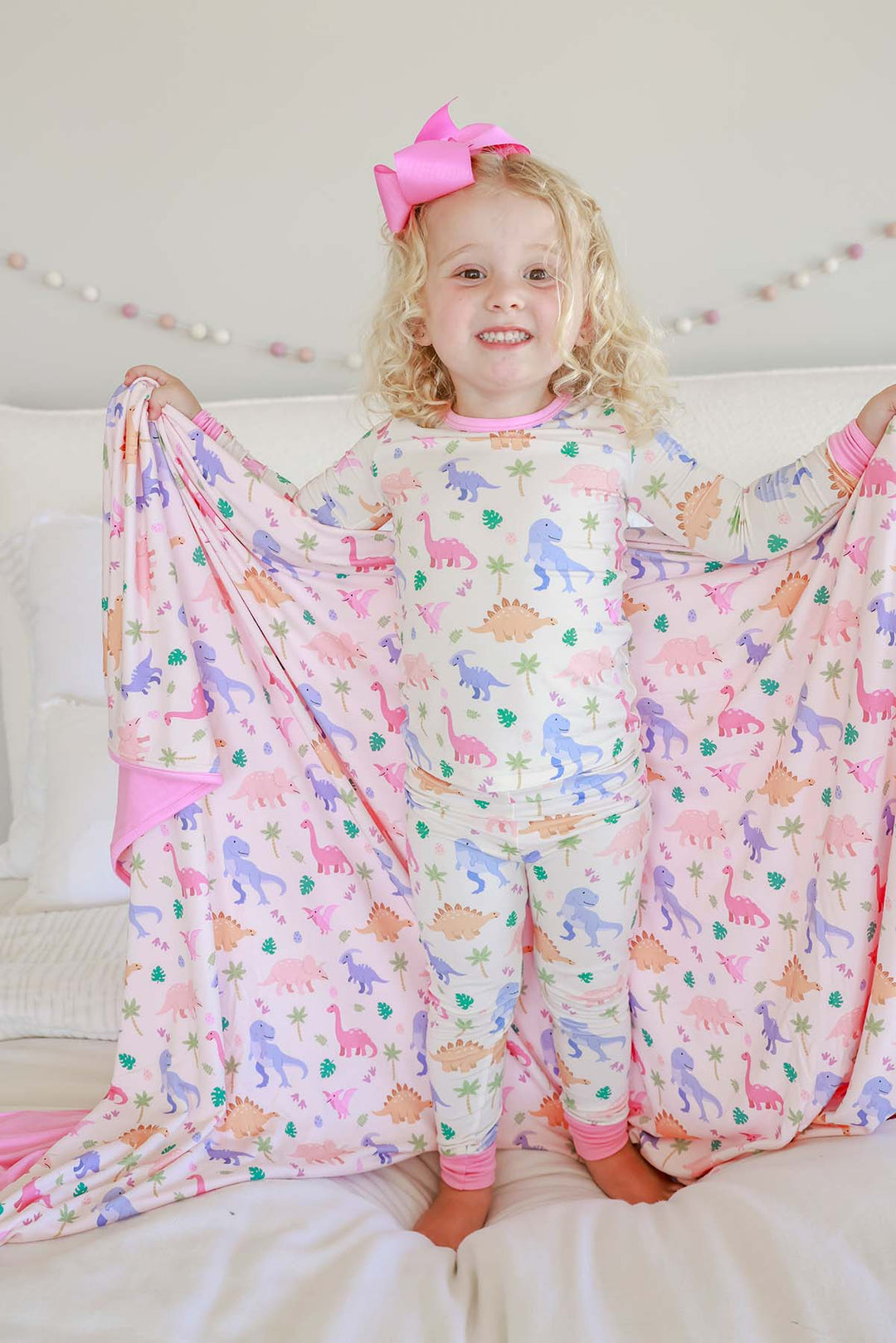 pink prehistoric bamboo blanket for kids