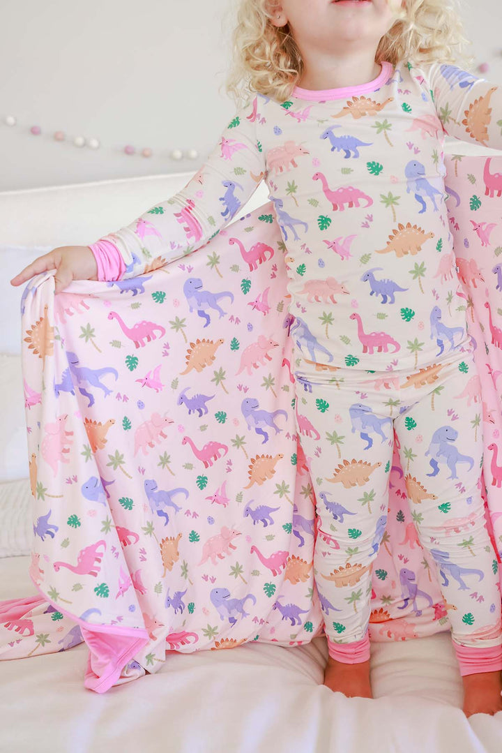 pink and purple dinosaur double sided bamboo blanket and 2pc pajama set