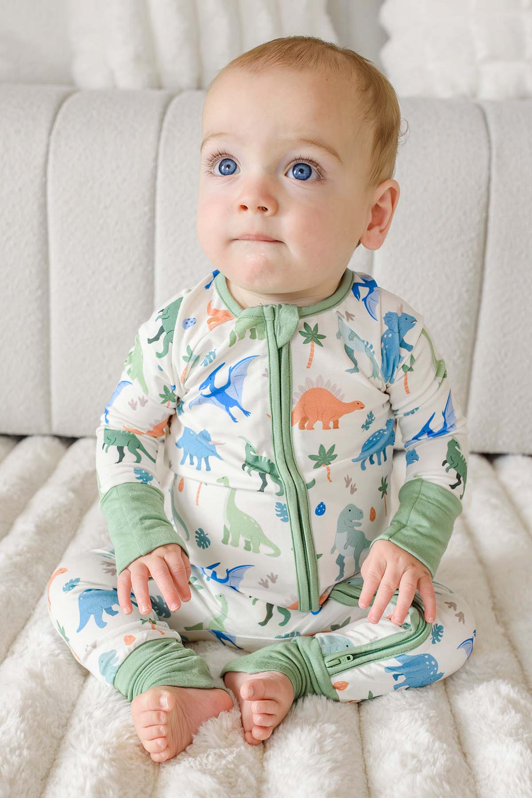 blue, orange and green dinosaur bamboo pajama romper for boys