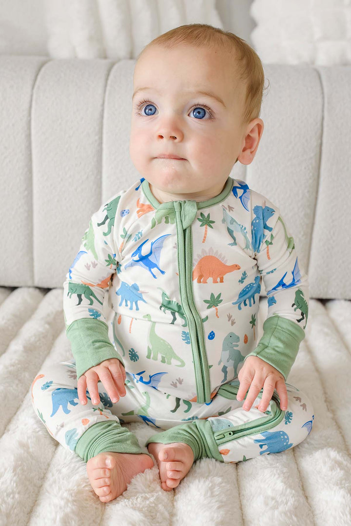 blue, orange and green dinosaur bamboo pajama romper for boys