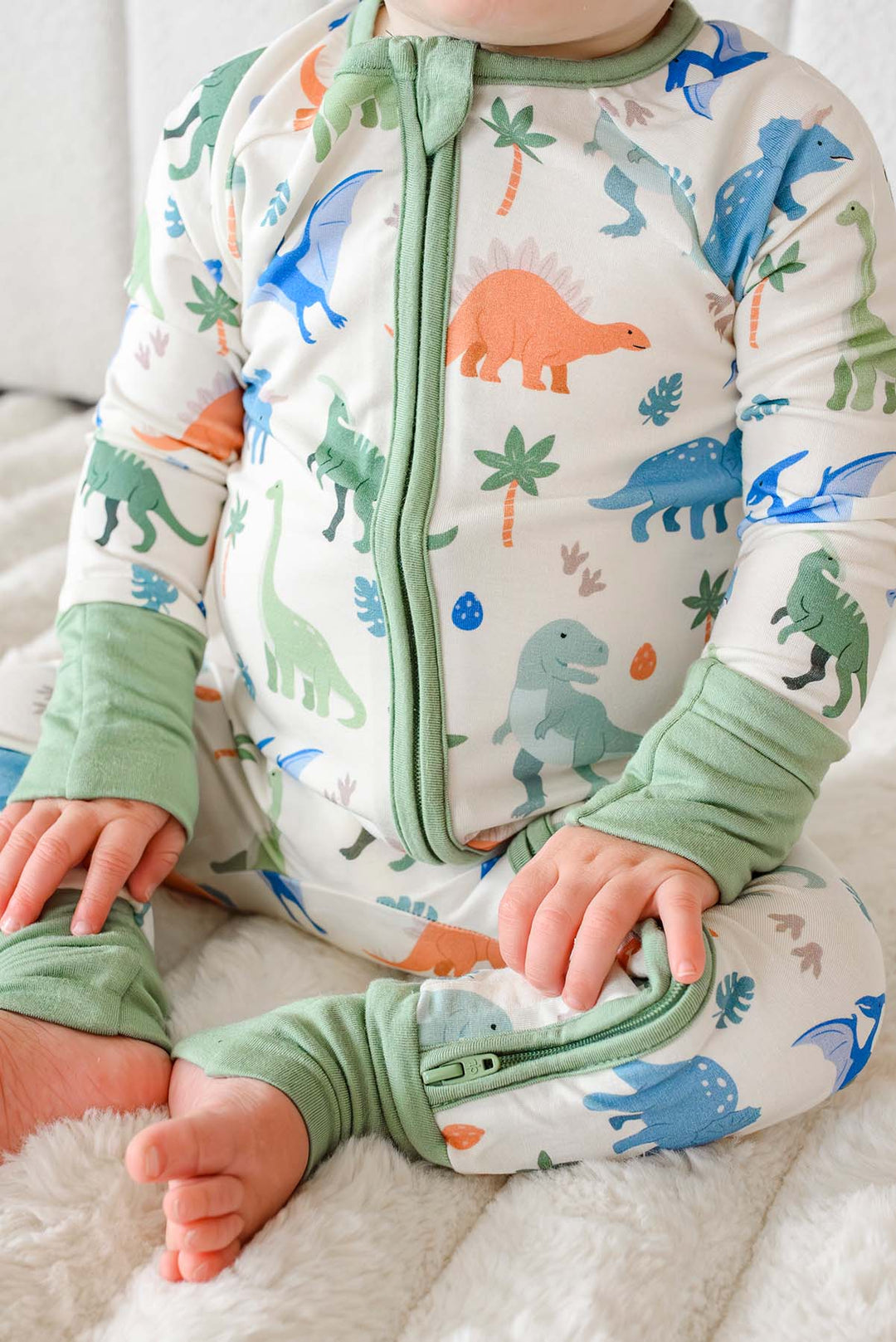 closeup of little fossil neutral convertible zip romper