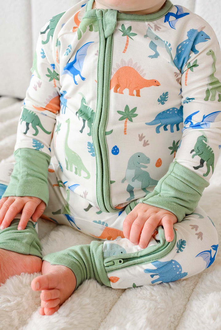 closeup of little fossil neutral convertible zip romper
