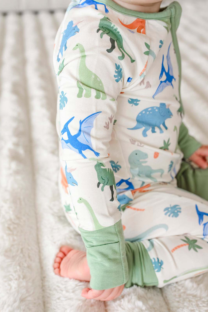 closeup of arm on little fossil neutral convertible zip romper