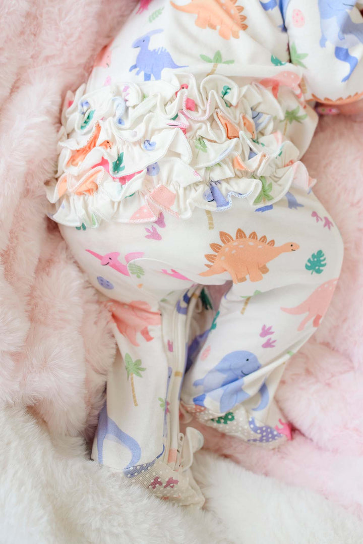 ruffle bottom zipper footie in little fossil pink print 
