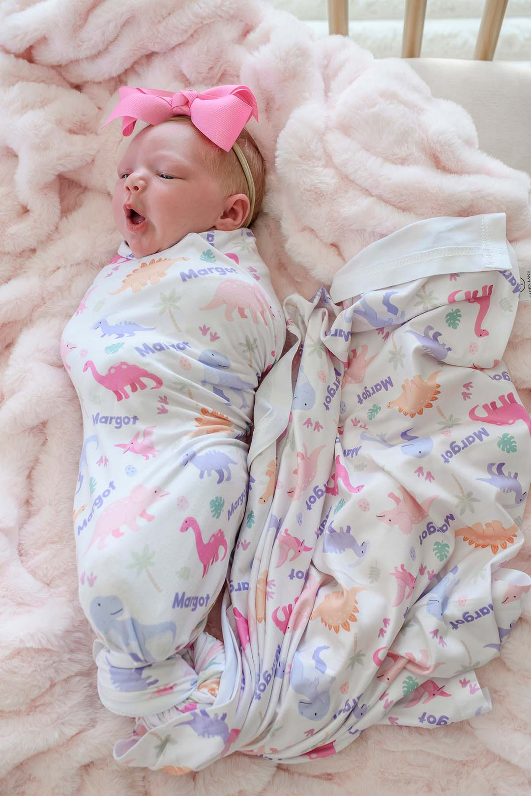 pastel dinosaur personalized swaddle for girls with bubblegum pink ribbon bow headband 