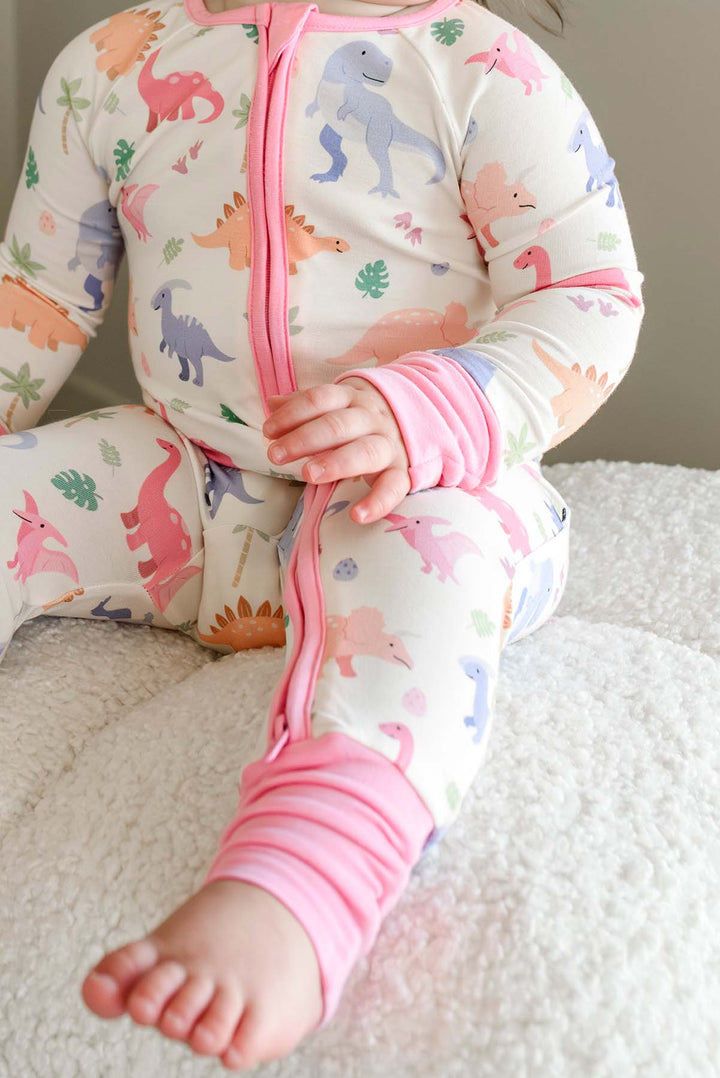 closeup of little fossil pink bamboo convertible zip romper for girls 