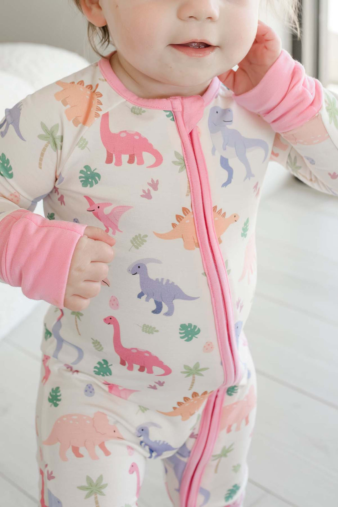 pastel pink, orange and purple bamboo convertible zip romper