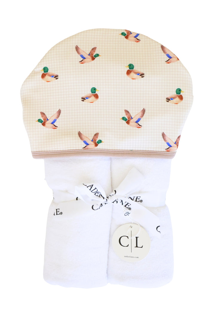 Little mallard duck print bamboo hooded towel folded and displayed with Caden Lane ribbon and gift tag, product packaging view