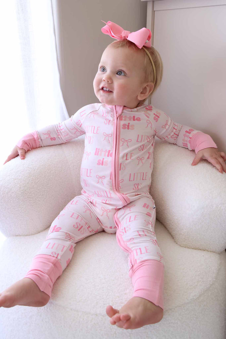 pink bow little sis block letter convertible zip romper pajama with flip mitts and footies 