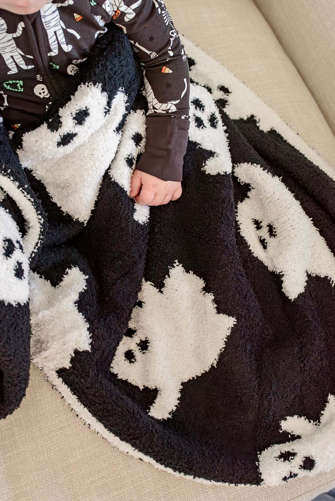 closeup of halloween ghost reversible blanket 