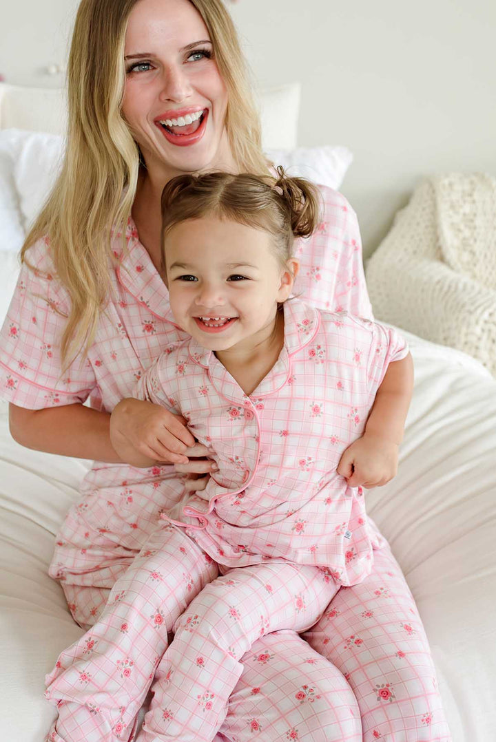 Mother and daughter laughing together in Primrose Plaid pajama sets