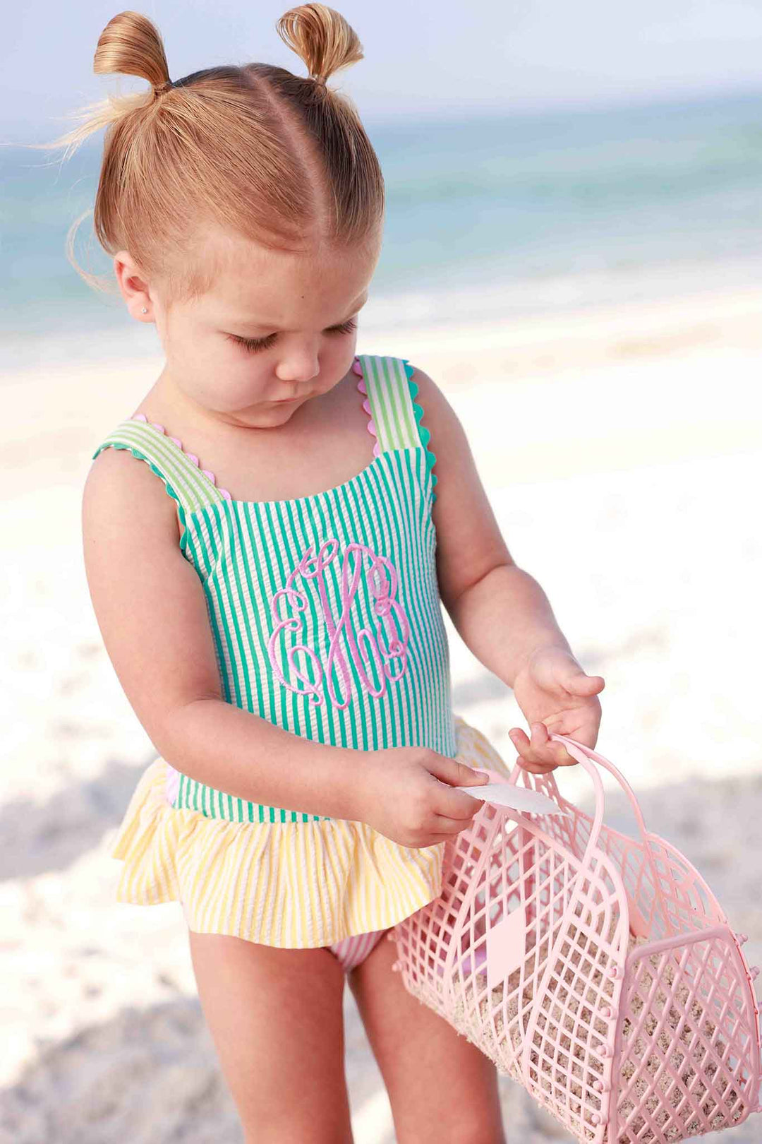 monogrammed seersucker one piece swimsuit for girls with pink monogram embroidery