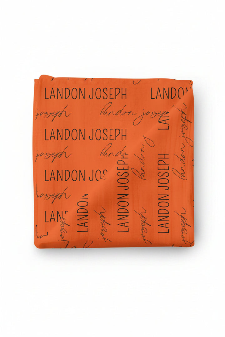personalized swaddle orange and black