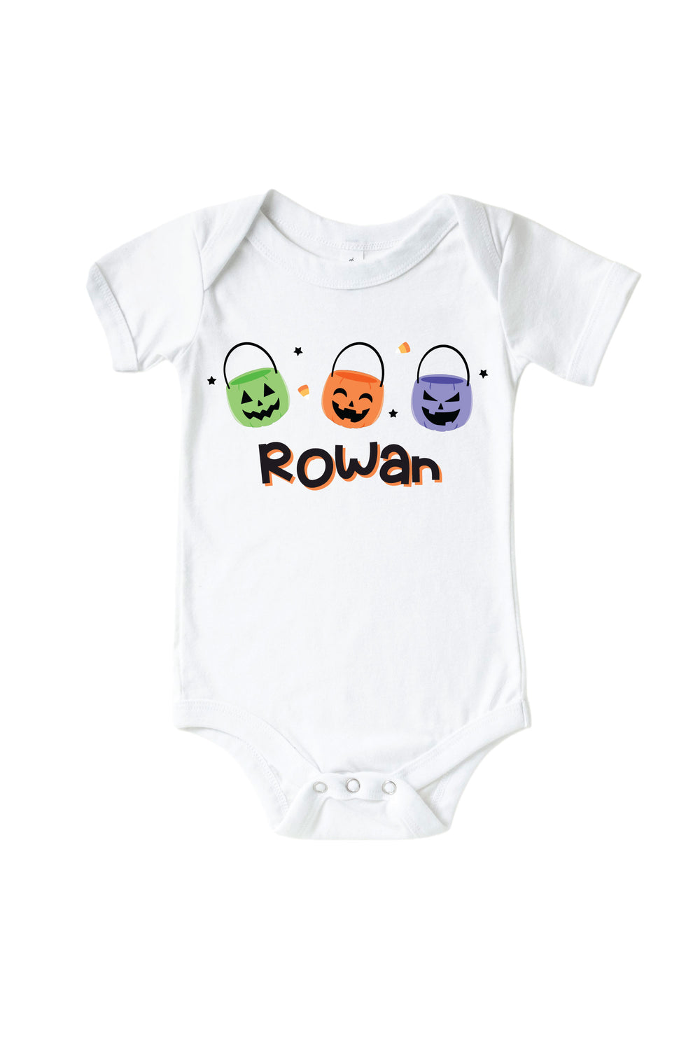 White kids' t-shirt and matching bodysuit personalized with names in orange script below three colorful jack-o-lantern candy bucket icons