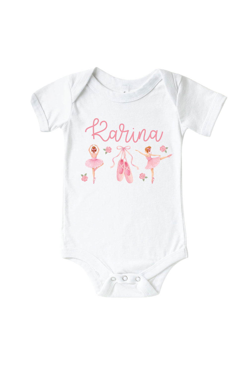 A white short-sleeve baby bodysuit featuring a pink graphic print with the name 'Karina' in cursive, ballet dancers, and pink ballet slippers, displayed on a clean white background.
