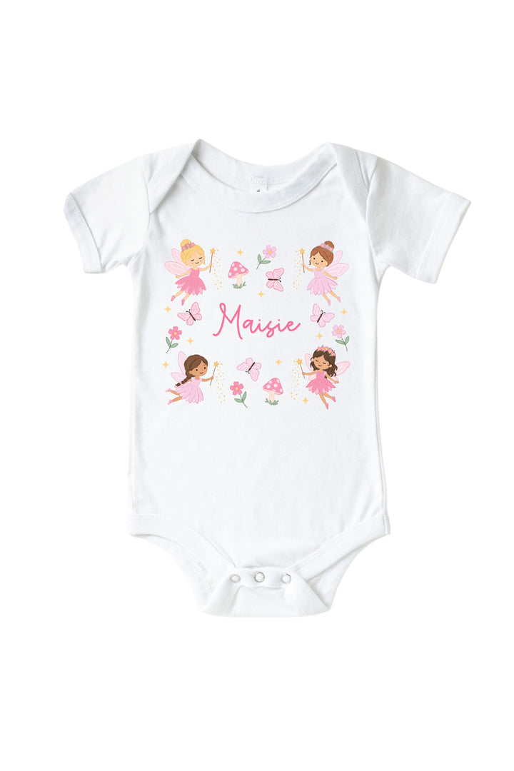 Personalized Fairy Wishes white baby bodysuit with pink fairies, mushrooms and butterflies around a custom name in pink script