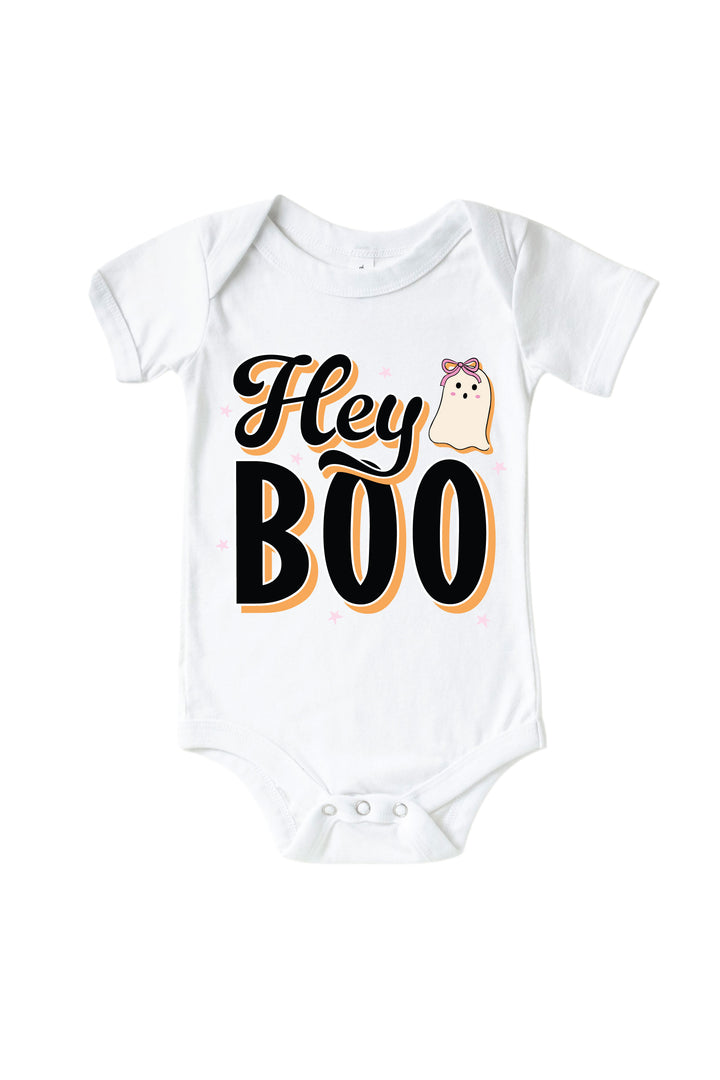 White baby bodysuit printed with 'Hey Boo' text and a pink-bowed ghost illustration.