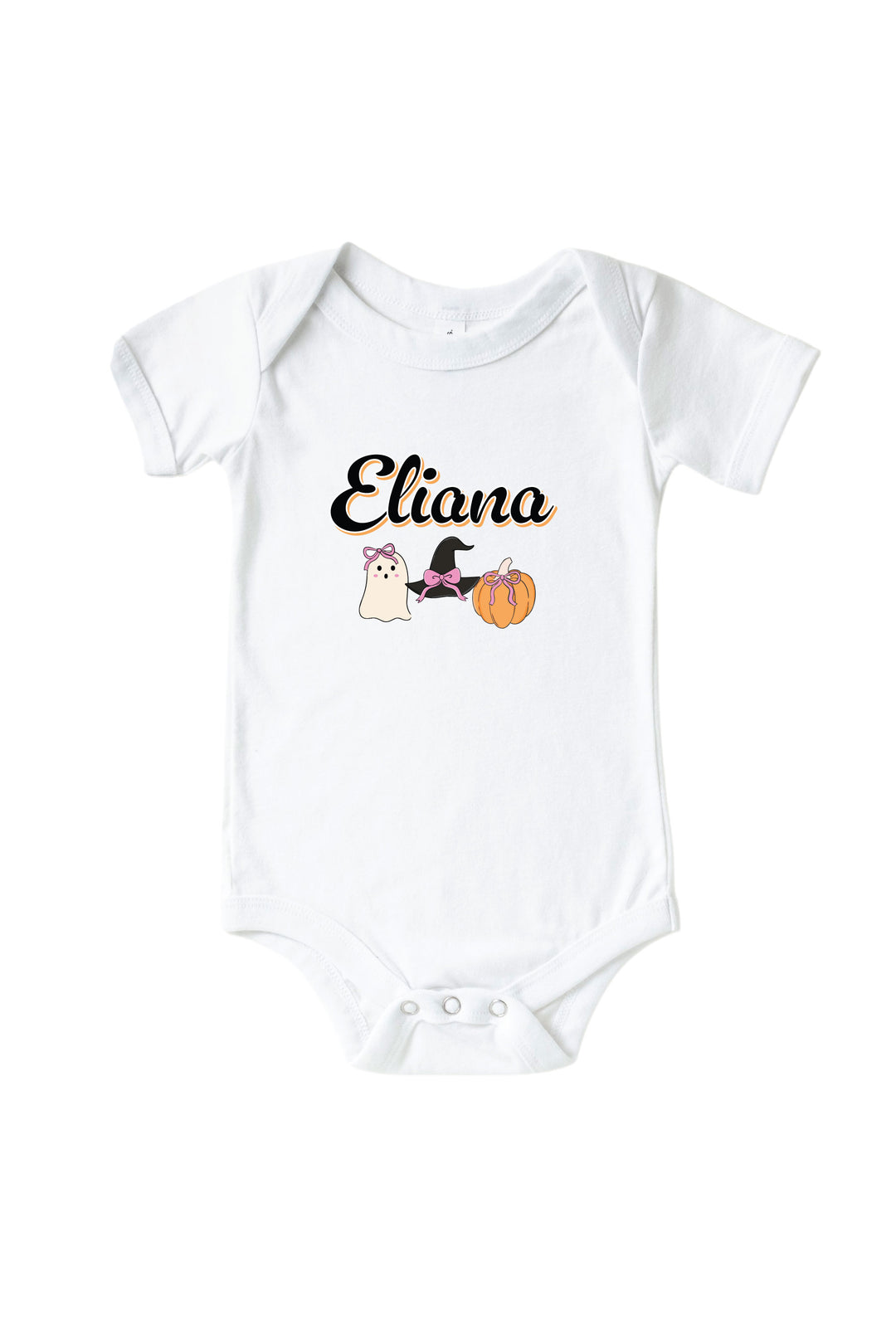 A white short-sleeve baby bodysuit with a custom graphic print on the chest. The print features the name 'Eliana' in black cursive, accompanied by a small cartoon illustration of a white cat wearing a black witch hat next to an orange pumpkin.