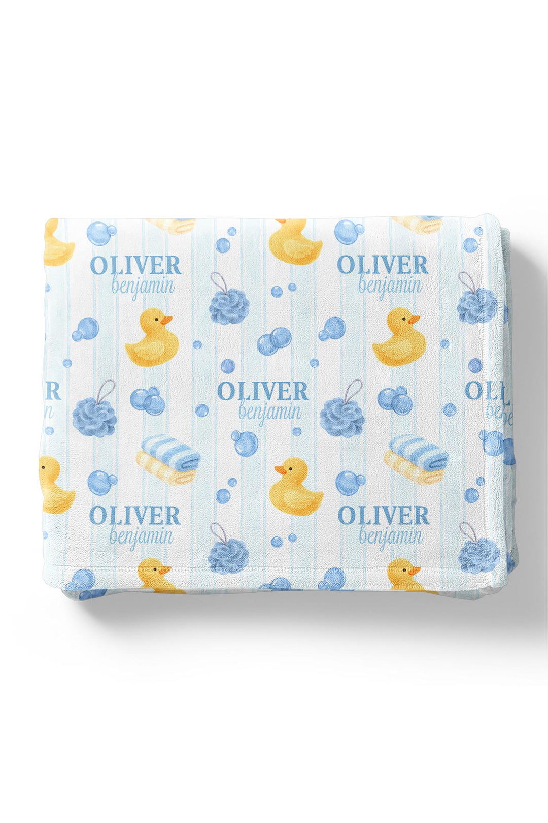 Young boy wrapped in blue Bubble Duckies personalized blanket with yellow rubber duck print and custom name in cozy pose