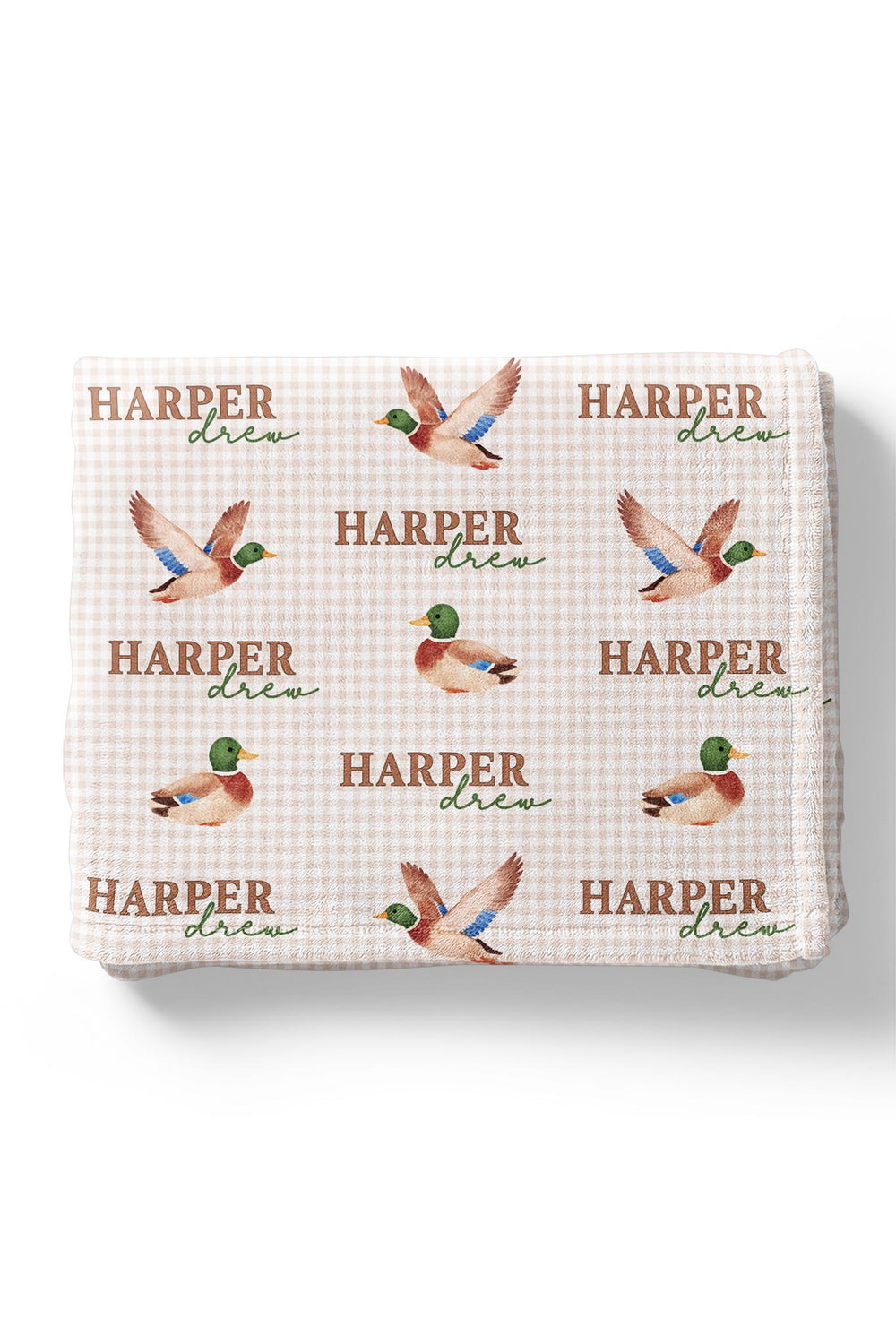 Folded personalized little mallard duck print kids blanket showing repeating mallard duck and name pattern on minky fabric