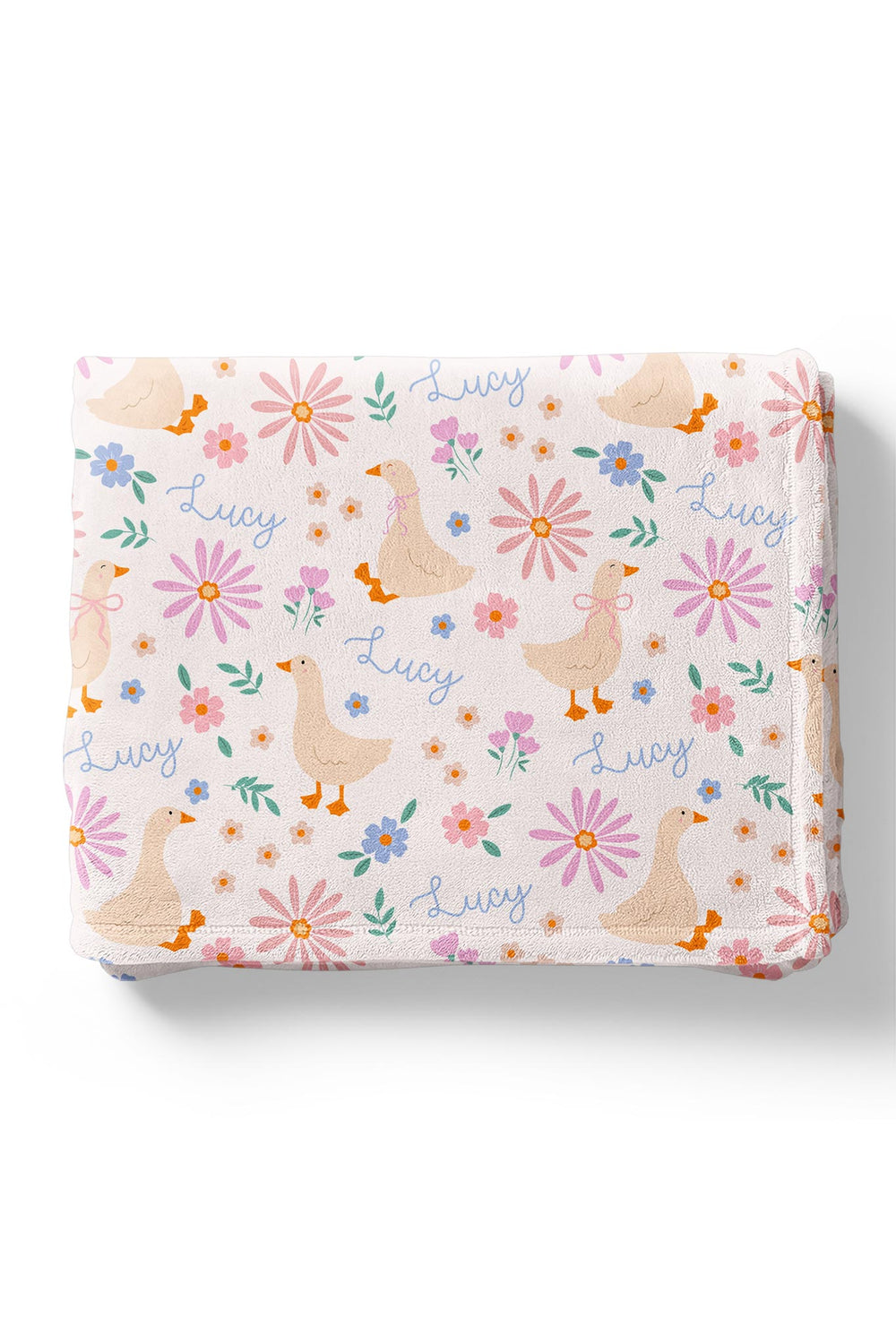 Personalized Kids Blanket in the Lucy Goosy duck and floral print folded neatly, showing the name Lucy printed throughout the design on a white background