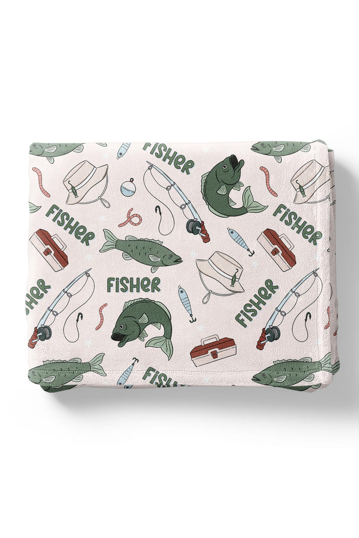 Personalized Off The Hook kids blanket folded showing fishing themed print with custom name