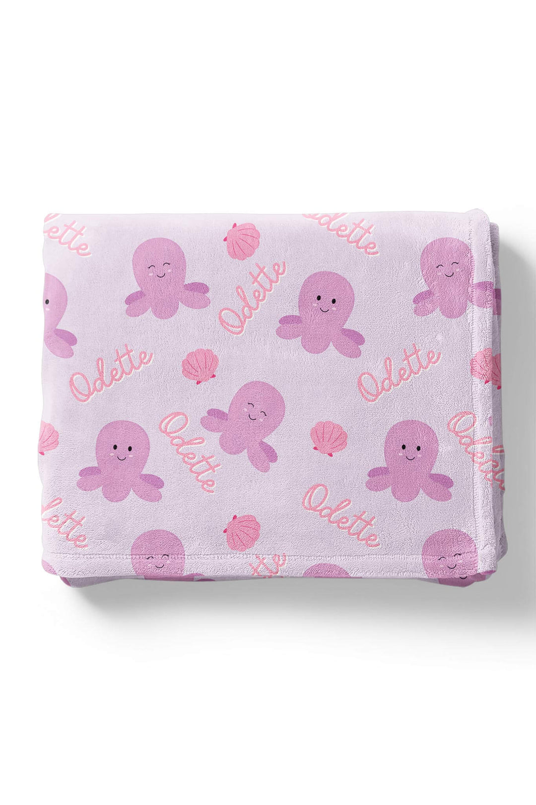 toddler wrapped in personalized sea snuggles kids blanket in lavender plush with purple octopus and seashell print and custom name in pink script