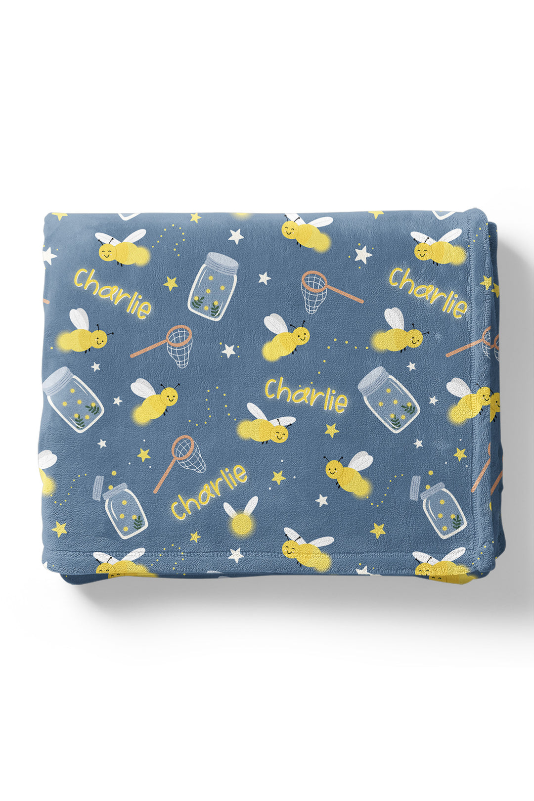 Product shot of a neatly folded Caden Lane blue plush personalized blanket in a Chasing Fireflies print featuring fireflies and mason jars, repeating the name "Charlie."