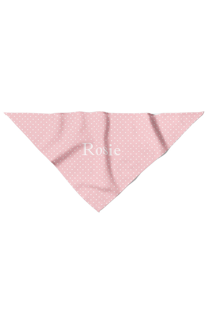Pink polka dot pet bandana laid flat in a triangle shape, personalized with the name Rosie in white lettering
