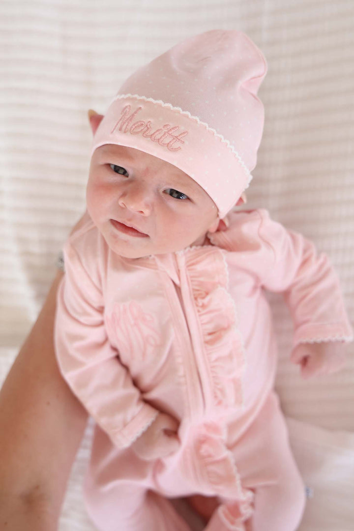 baby in pink picot trim bamboo zipper footie outfit