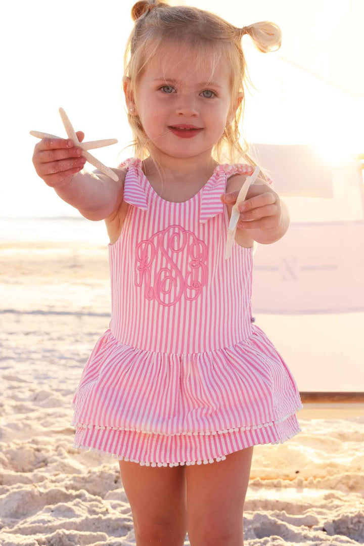 pink seersucker skirted one piece swimsuit for girls with pink embroidered monogram 