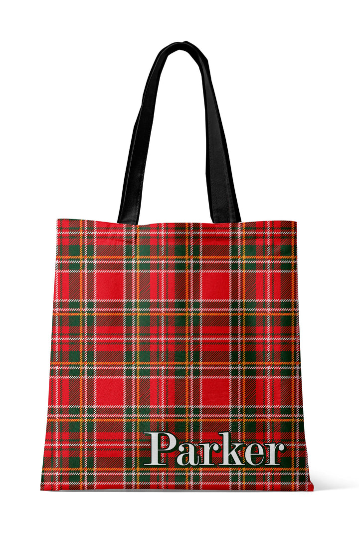 Caden Lane personalized Christmas tote bag featuring a custom name on a classic red and green plaid design, perfect for holiday shopping, Christmas gifts, travel, and matching family pajamas.