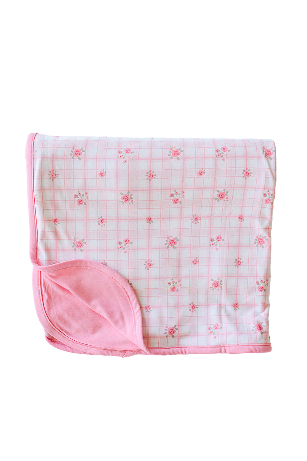 Primrose Plaid double sided bamboo blanket showing pink reverse side