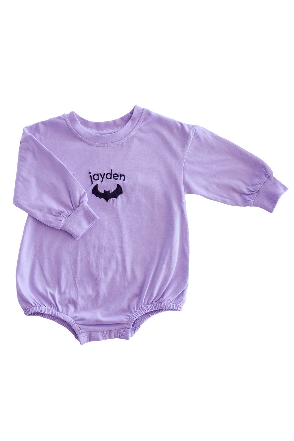 A baby long-sleeve bodysuit in light purple with a black bat graphic and the name 'jayden' printed on the chest, displayed flat against a white background.