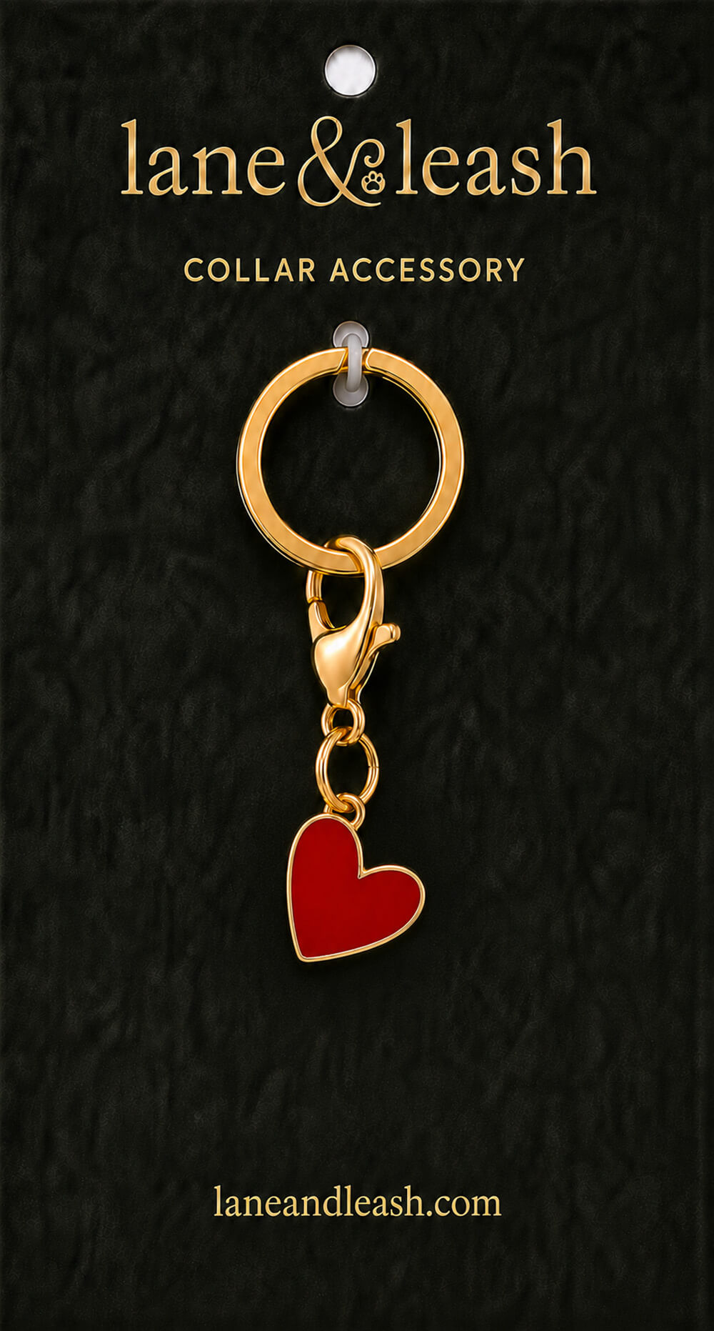 Red enamel heart Lane & Leash collar accessory charm displayed on dark green packaging card with lobster claw clasp and jump ring