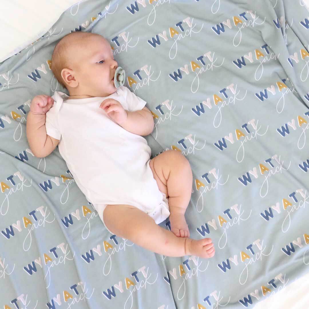 moss green block lettered personalized swaddle blanket 