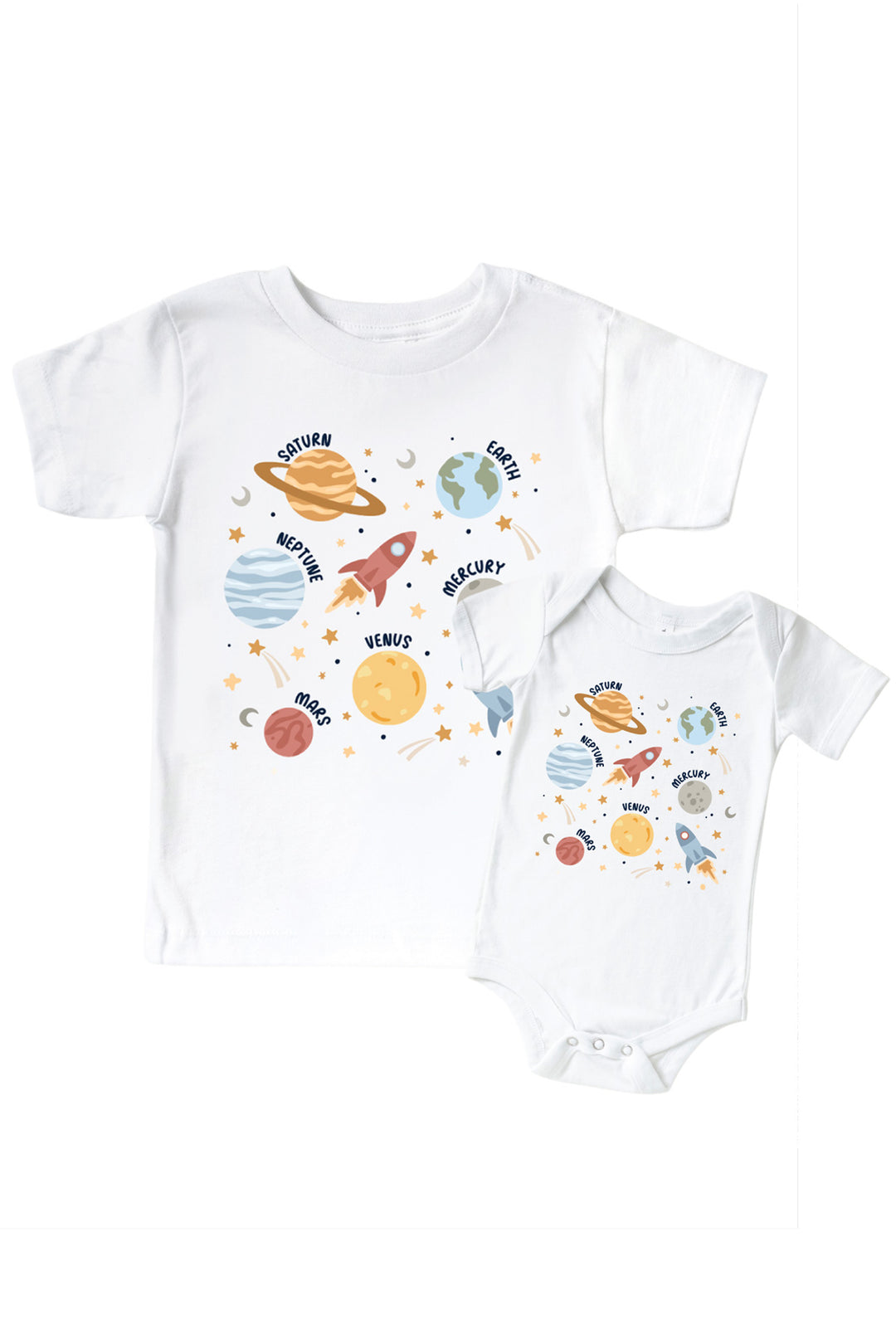 Flat lay of a matching Caden Lane white kids’ tee and bodysuit pair with a Stellar Snuggles graphic featuring a rocket and planets, reading “Nathan.”