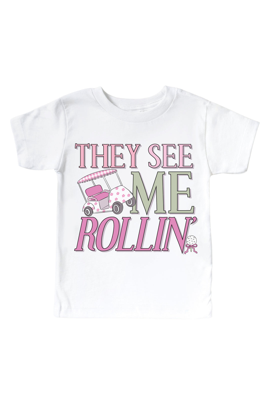 pink they see me rollin' golf graphic kids tee in white, caddie crew, flat lay