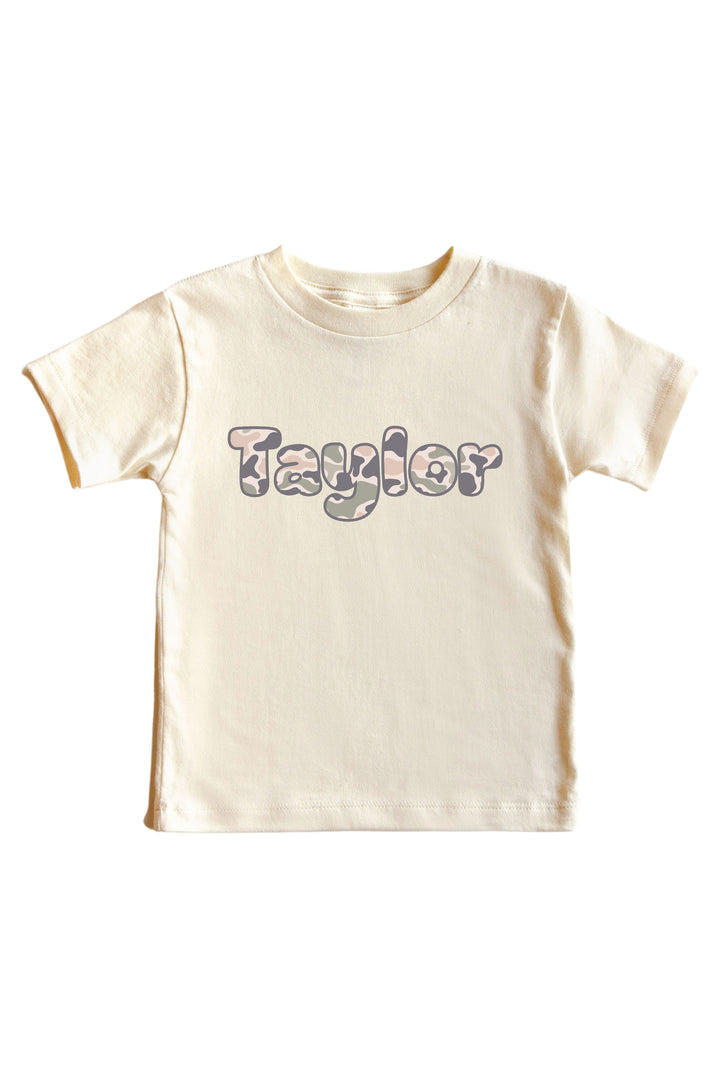 Natural cream kids graphic t-shirt with personalized camo-print name graphic on chest