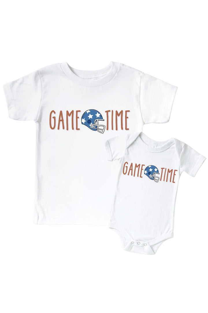 Caden Lane Graphic Bodysuit & Kids' Tee, Game Time Blue — matching toddler-and-baby t-shirt set in white, featuring a "Game Time" graphic with a blue star helmet.
