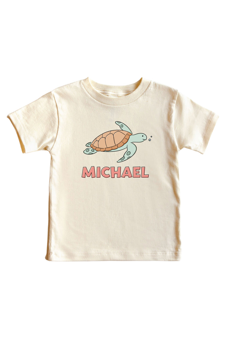 personalized turtley rad graphic bodysuit and kids tee in natural – customizable with a name