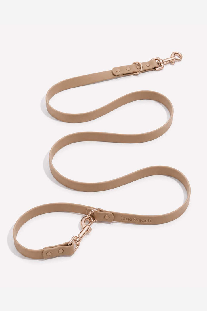 Waterproof silicone dog leash in mocha, showing full length with snap hook clasp and loop handle