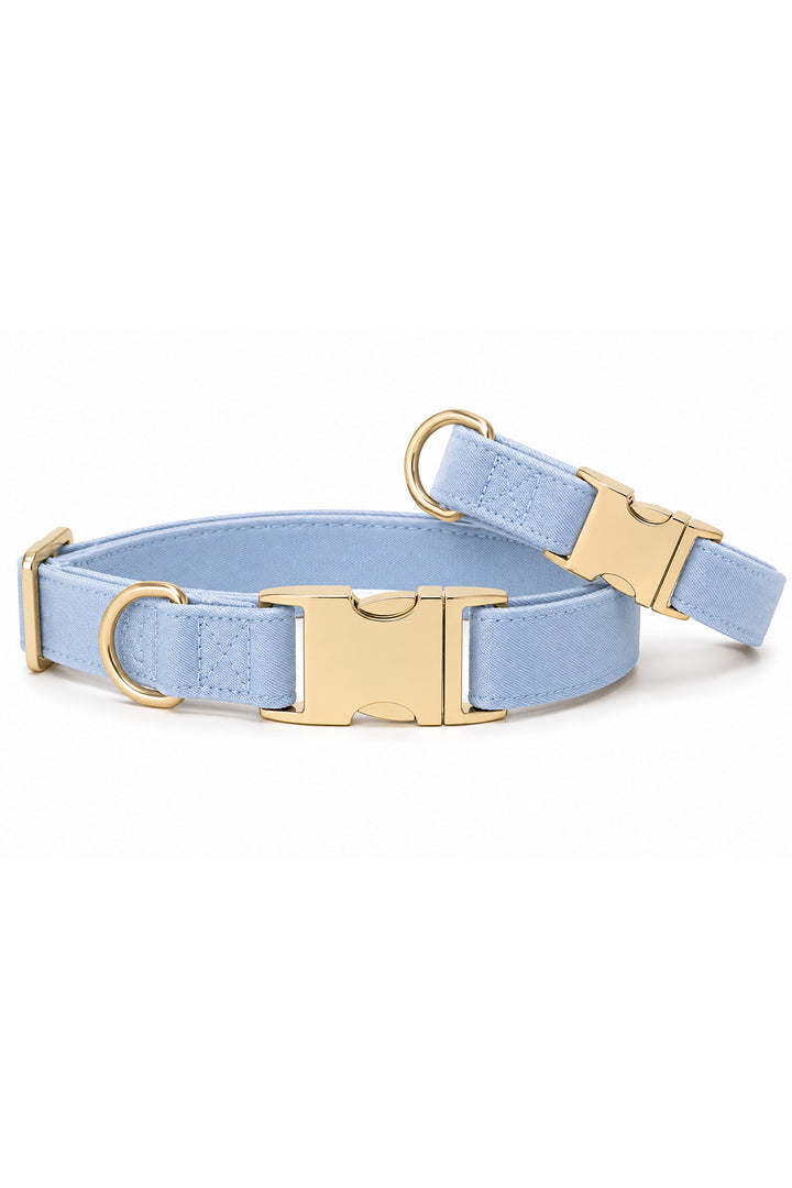 Caden Lane denim days light blue denim fabric dog collar shown at angle revealing padded interior and gold side-release buckle